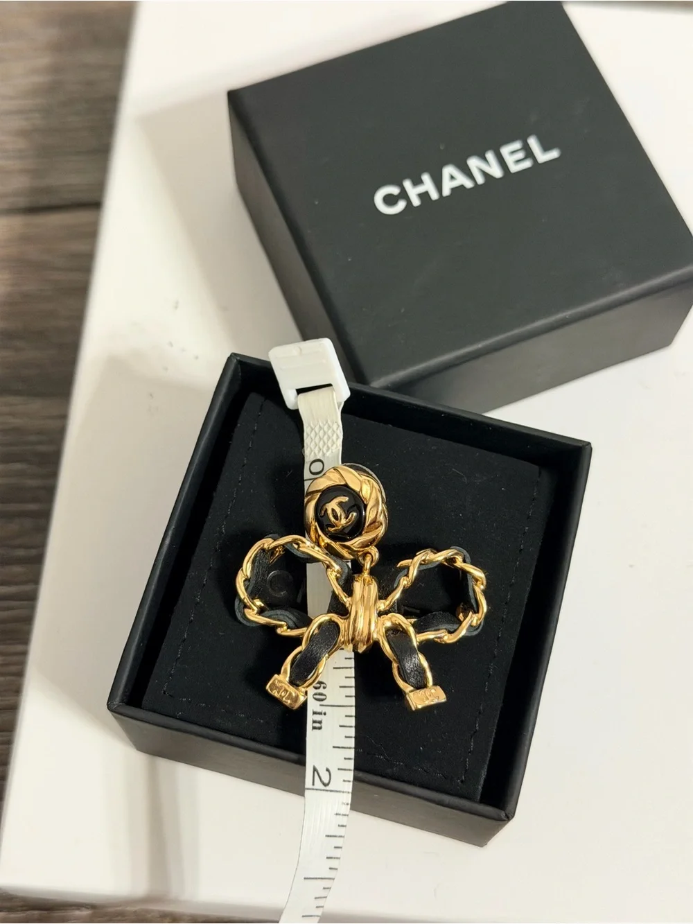 CHANEL Leather Bow CC Gold Dangle Earrings